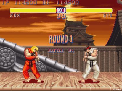 A a clássica versão do Super Street Fighter II: The New Challengers, rodando no MAME. A imagem mostra Ken vs Ryu.